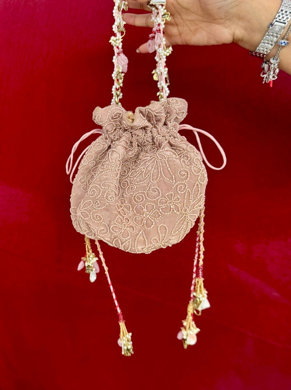 Beige embroidered festive potli bag