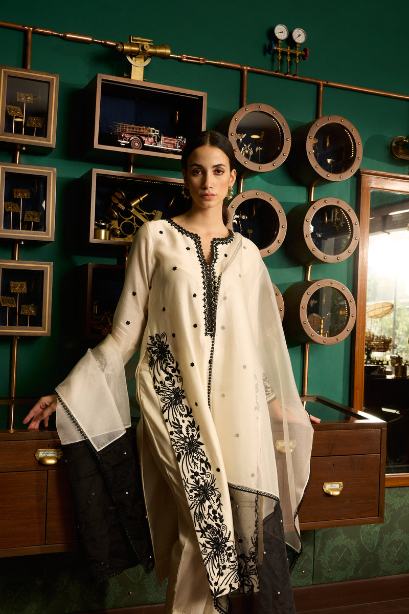 Off-white Embroidered Chanderi Silk suit