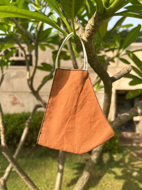 Tan-brown mask
