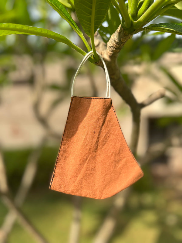 Tan-brown mask